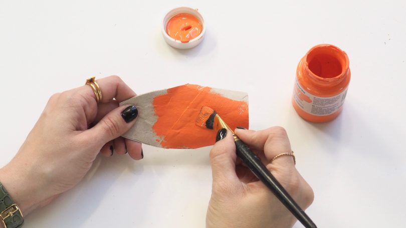 Peindre le poisson en orange